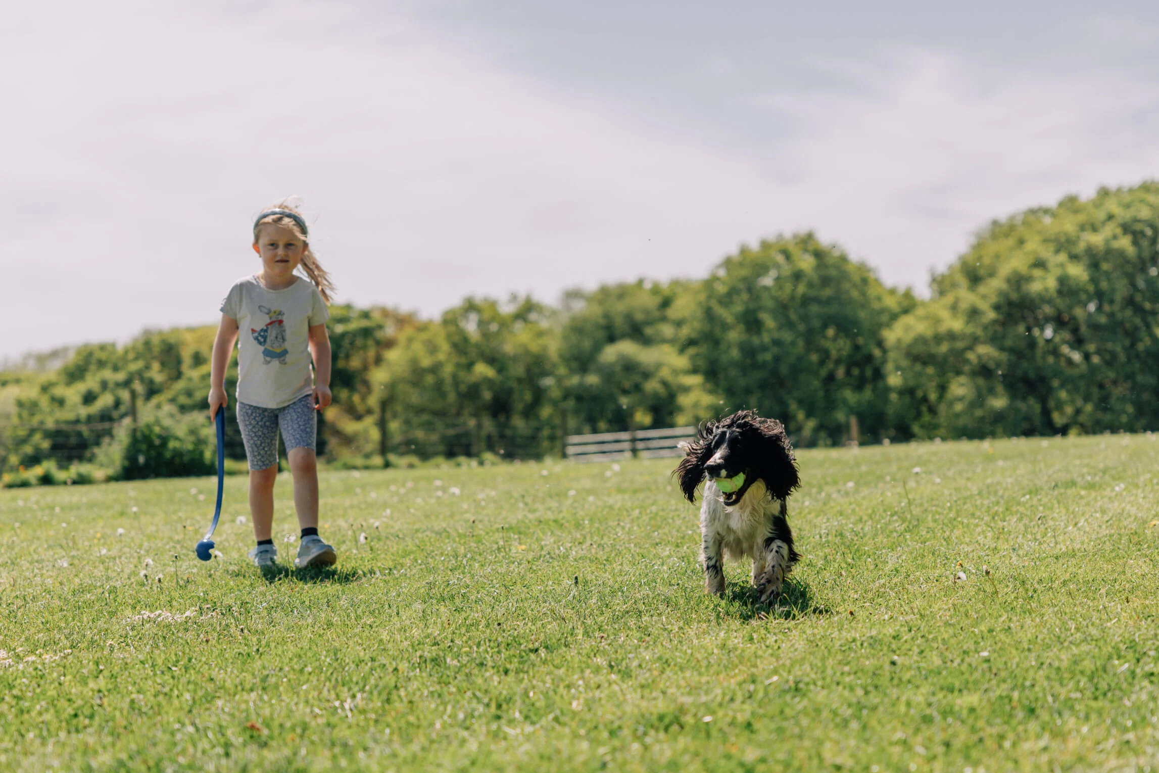 girl walking dog at yeatheridge farm