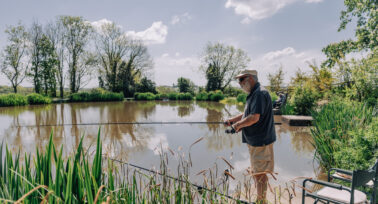 angler fishing at yeatheridge farm devon