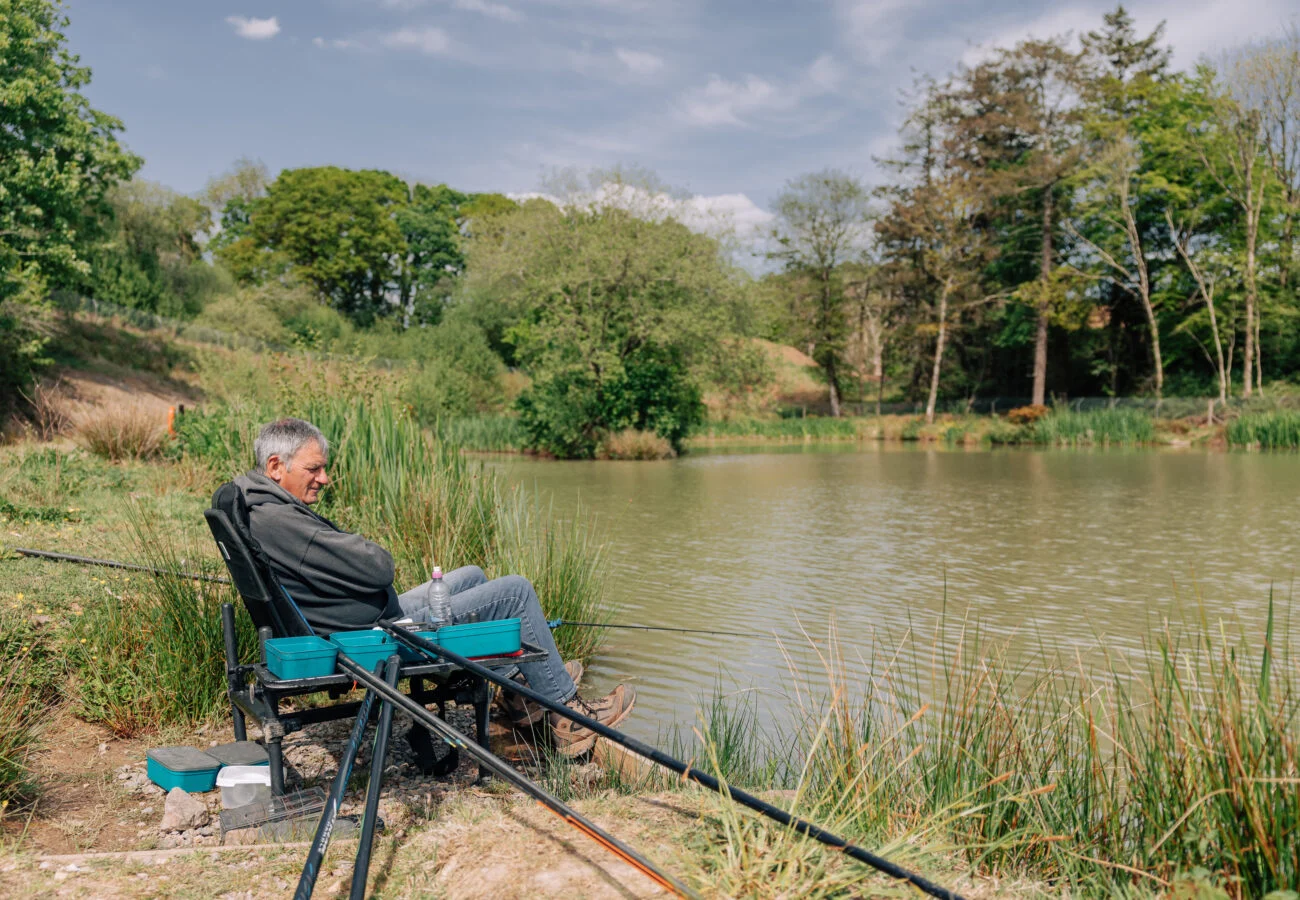 angler coarse fishing during a devon fishing holiday at yeatheridge