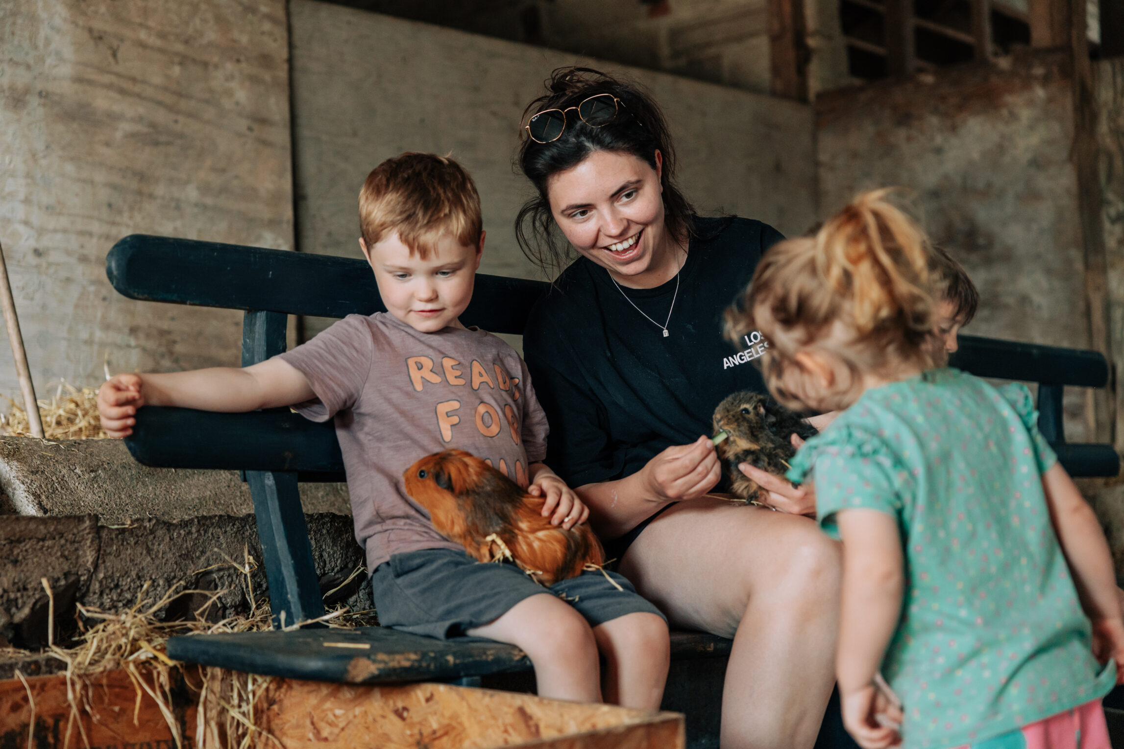 family holding guinea pig